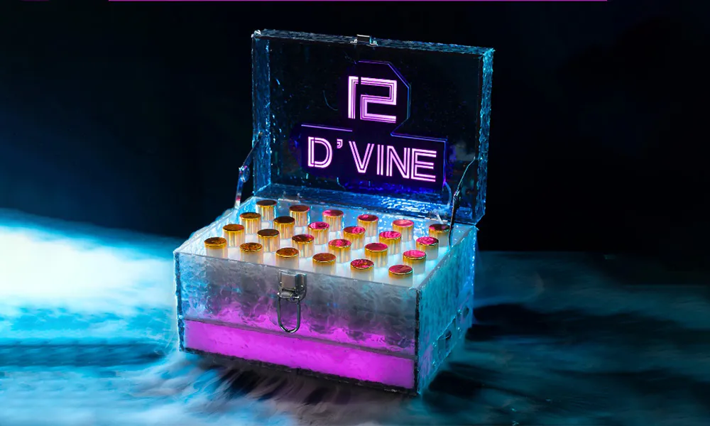 Ice textured transparent glowing liquor chest, purple neon "D'VINE 12" on lid, contains 12 mini bottles, surrounded by smoky mist